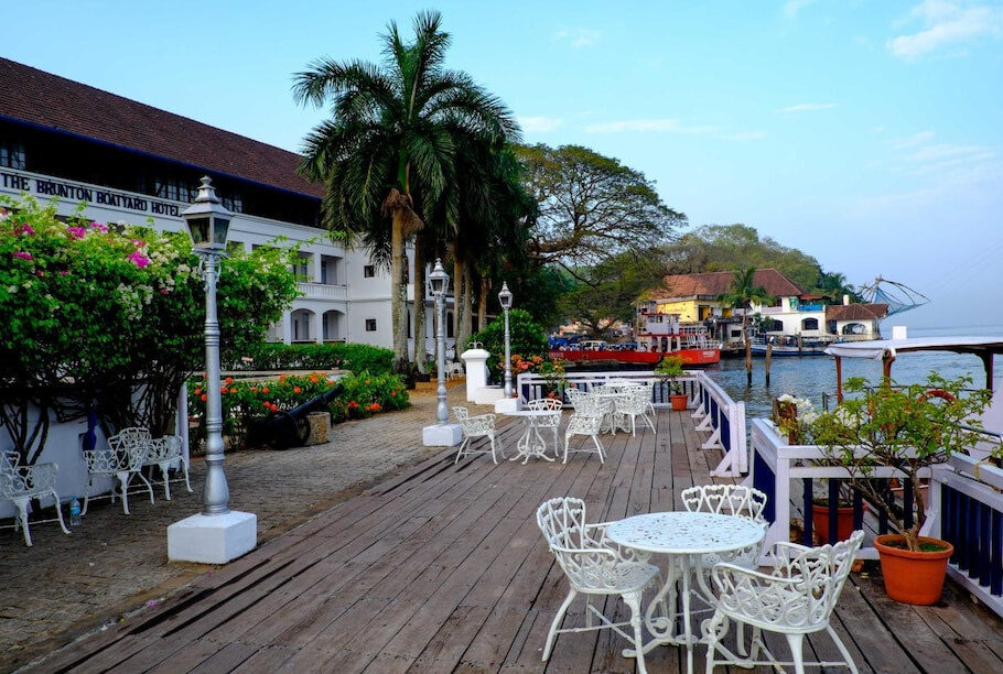 Pier dining furniture with lamp posts, Brunton Boatyard, Fort Kochi