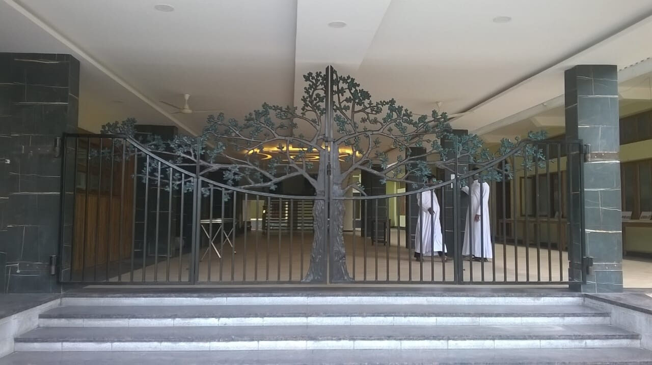 Cast aluminium tree-motif gate at Bishop Palace, Thrissur